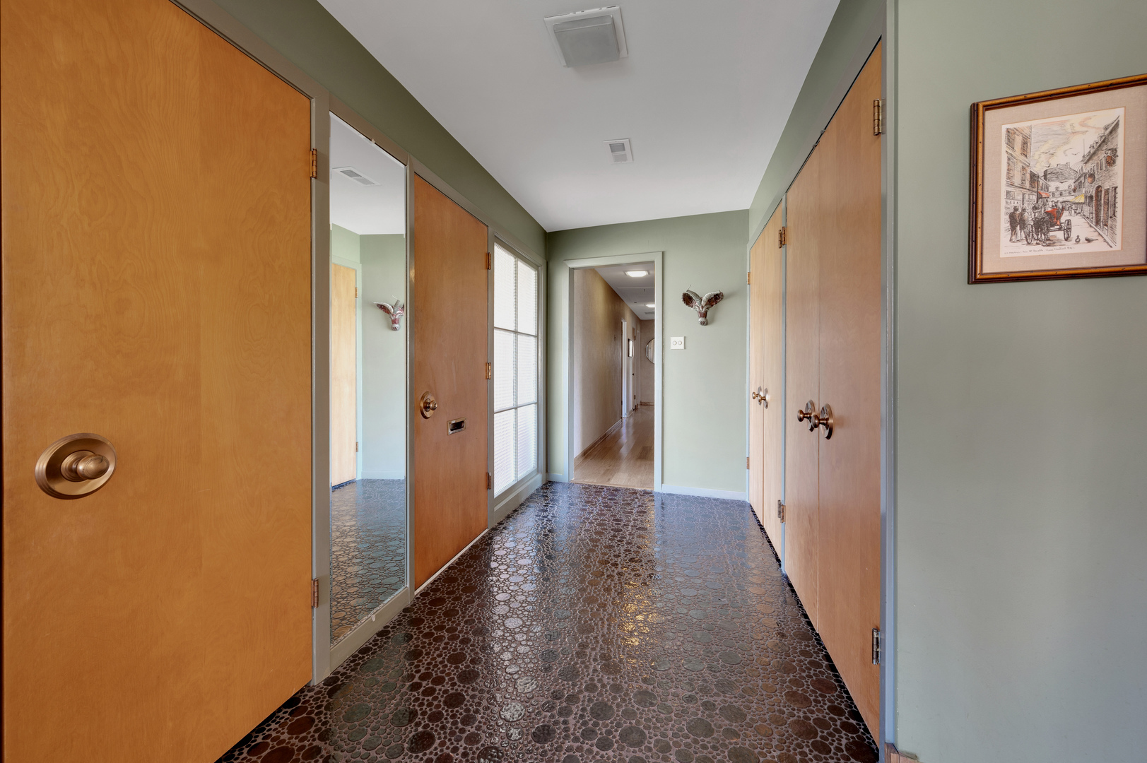 934 Gardner Road Flossmoor, IL 60422 - Photo 4 of 26 a view of a hallway with wooden floor and closet