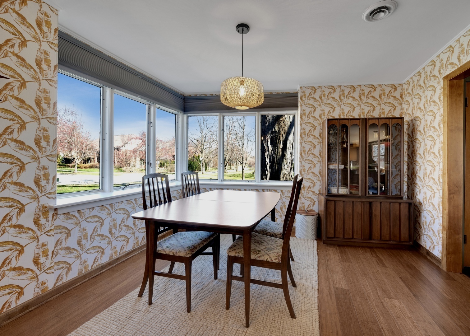 934 Gardner Road Flossmoor, IL 60422 - Photo 8 of 26 a view of a dining room with furniture window and wooden floor