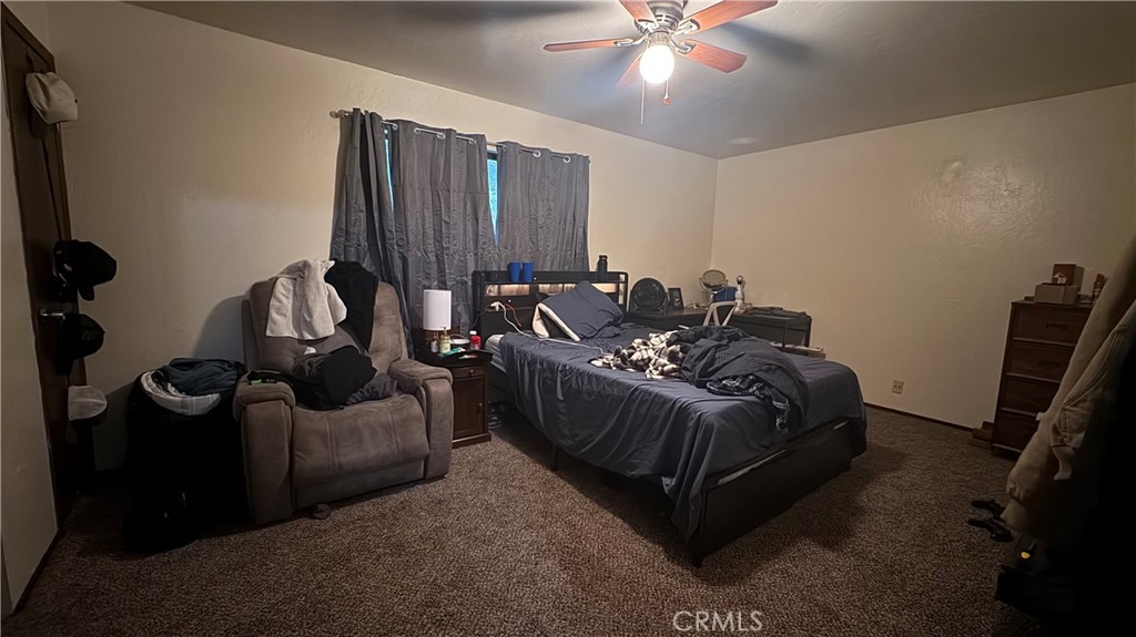 25248 Robinson Road Willits, CA 95490 - Photo 17 of 19 a living room with furniture and a flat screen tv