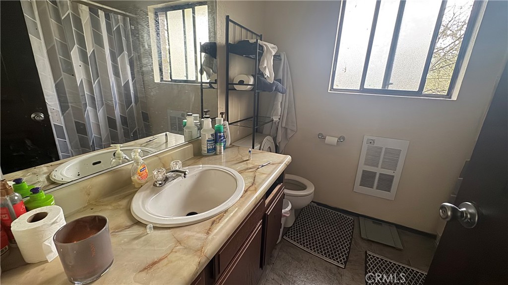 25248 Robinson Road Willits, CA 95490 - Photo 19 of 19 a bathroom with a sink and a mirror