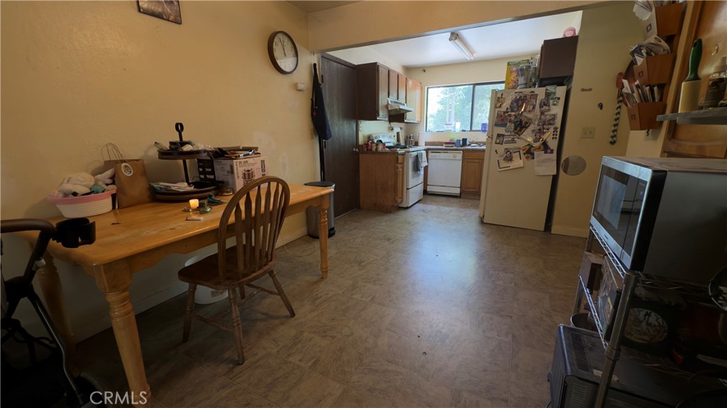 25248 Robinson Road Willits, CA 95490 - Photo 5 of 19 a view of a workspace with furniture and a window
