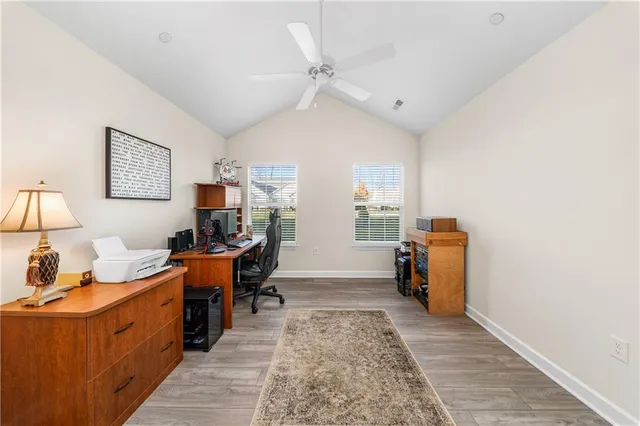 a view of a workspace with furniture