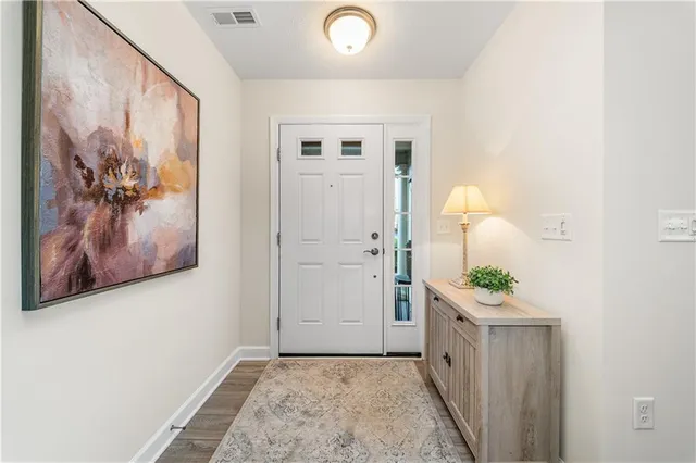 a view of a hallway with closet