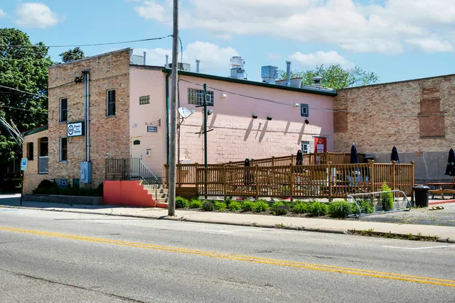 a car parked in front of a building