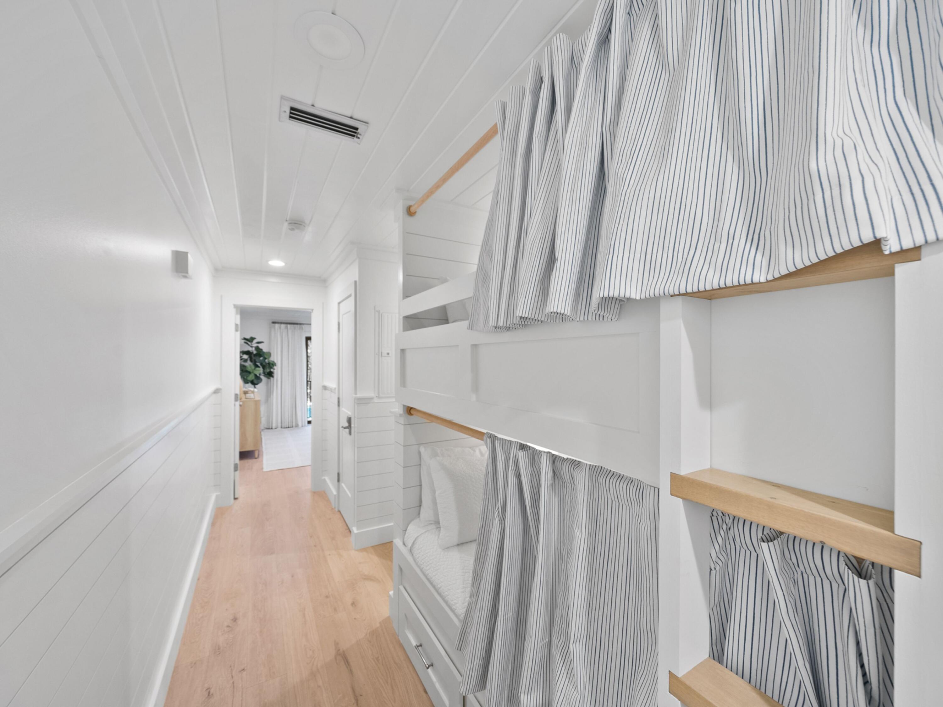 81 South Orange Street, Unit 205 Inlet Beach, FL 32461 - Photo 12 of 28 a view of a hallway with wooden floor and entryway
