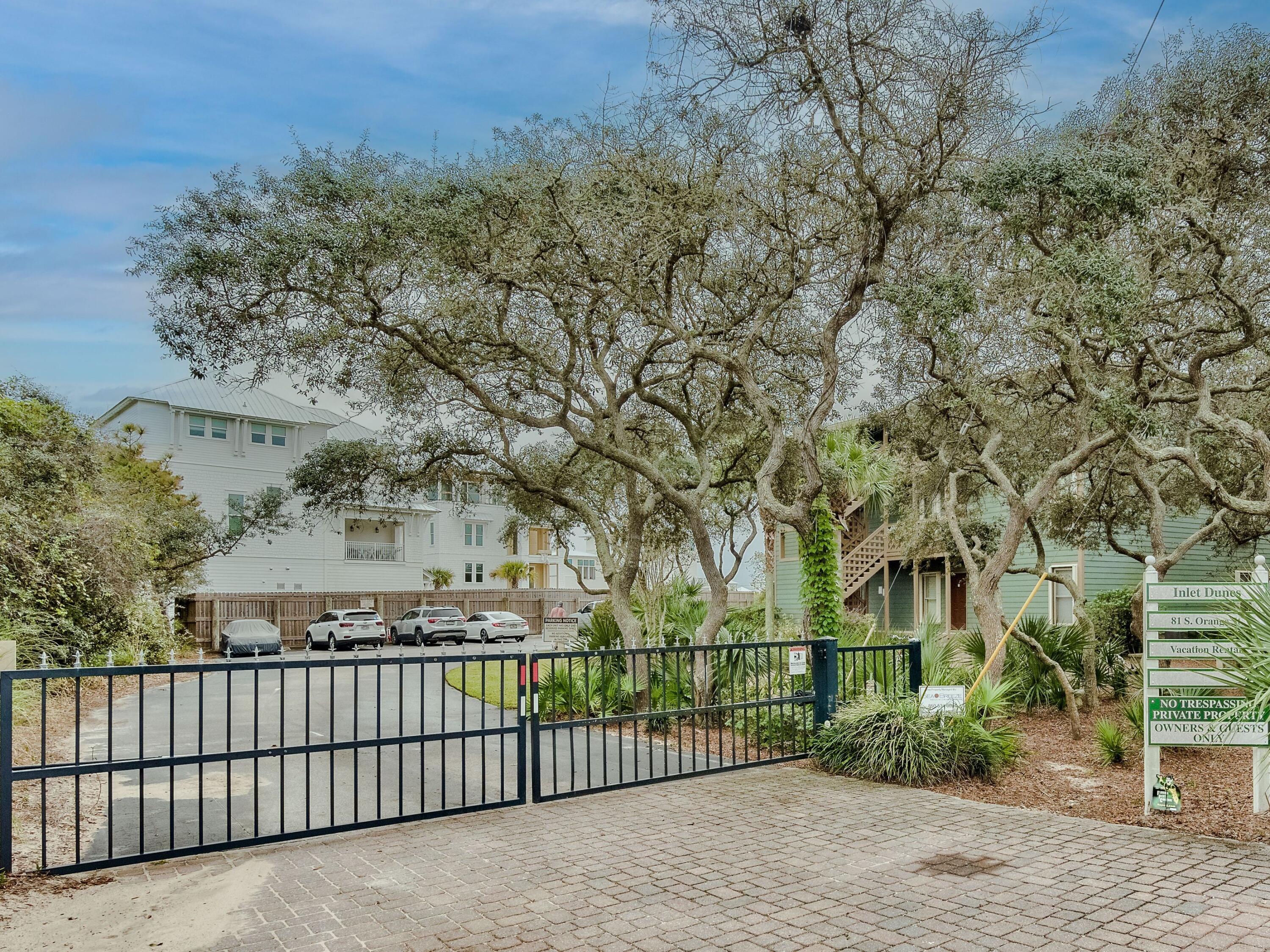 81 South Orange Street, Unit 205 Inlet Beach, FL 32461 - Photo 19 of 28 a view of a wrought iron fences in front of house