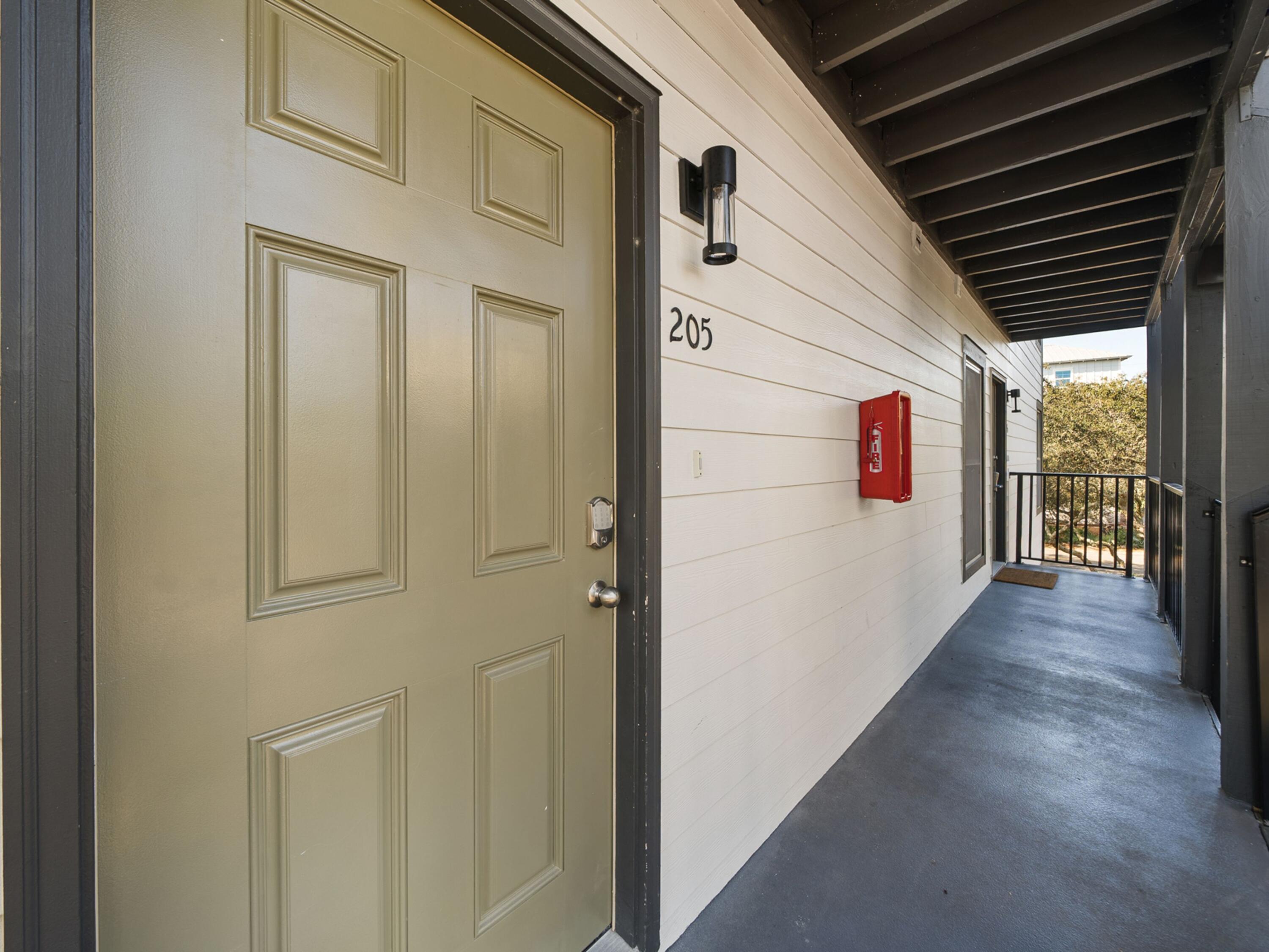 81 South Orange Street, Unit 205 Inlet Beach, FL 32461 - Photo 6 of 28 a view of a porch with wooden floor and entryway