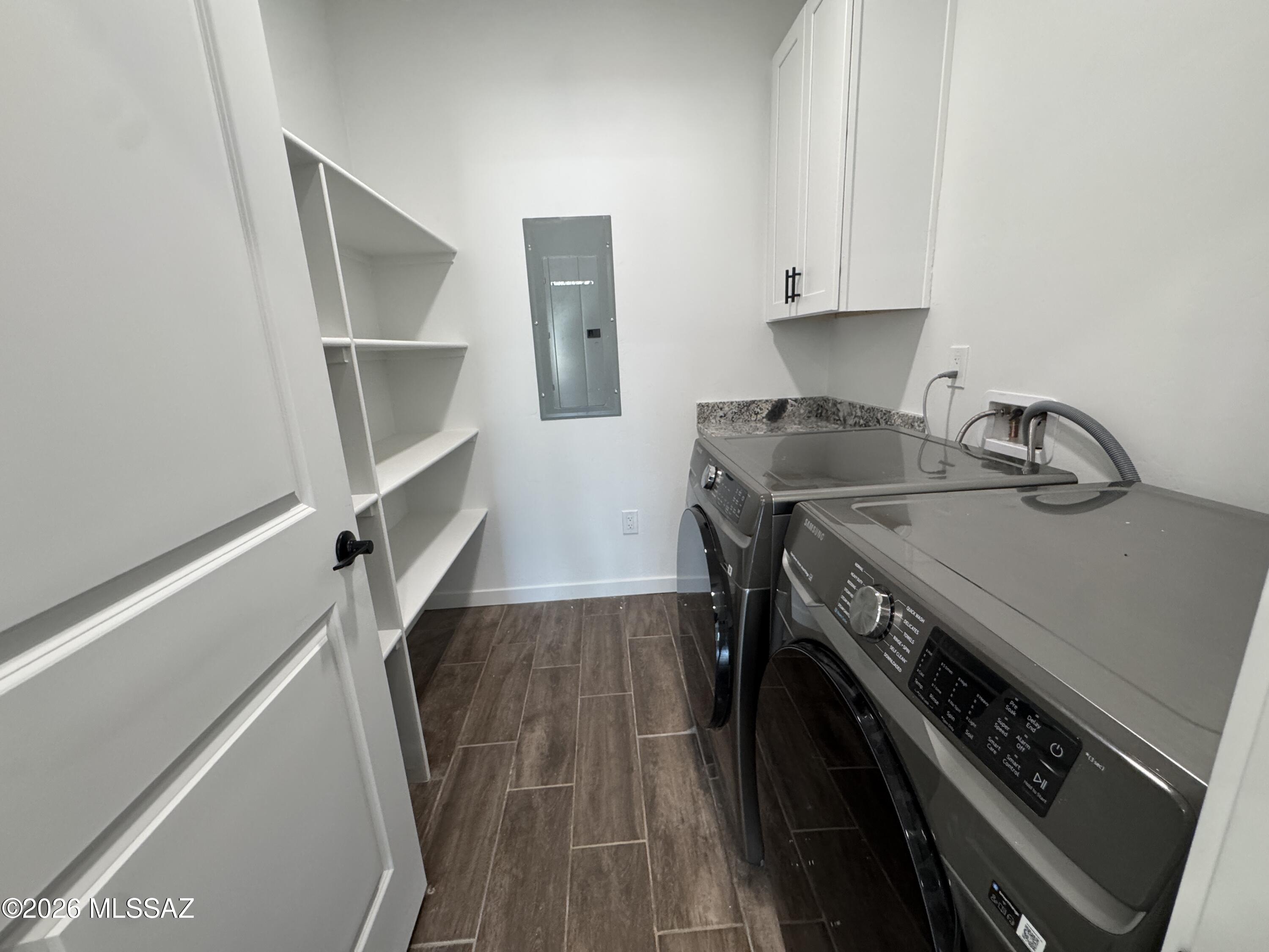 2122 North Ralph Avenue, Unit 1 Tucson, AZ 85712 - Photo 5 of 10 a kitchen with a stove and a refrigerator