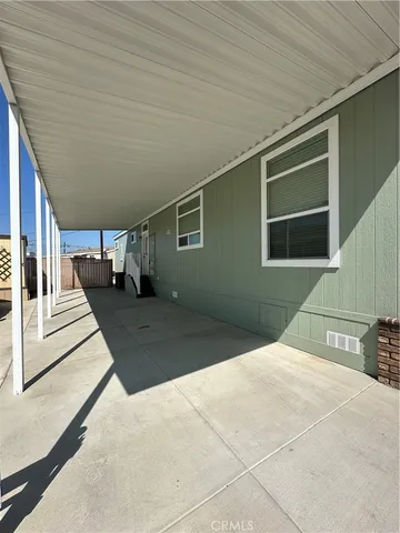 a view of a balcony with car parked