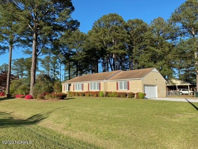 1013 Tar Heel Road South Wilson, NC 27893 - Photo 2 of 13 Side Load Garage/Fenced Bkyd
