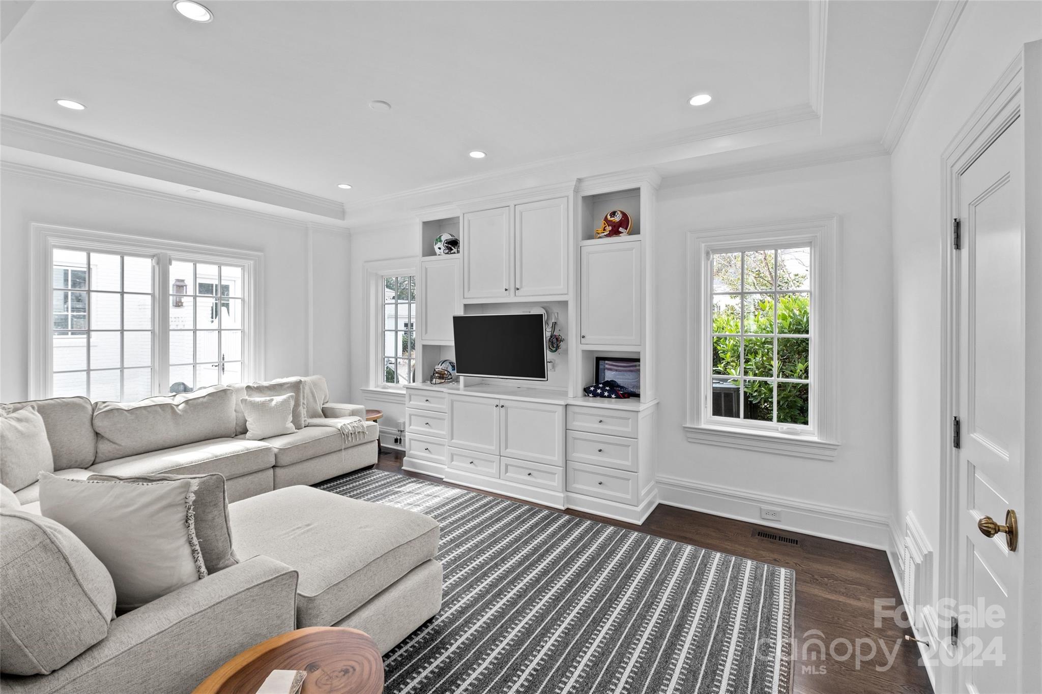 1930 Queens Road West Charlotte, NC 28209 - Photo 12 of 47 a living room with furniture and a flat screen tv