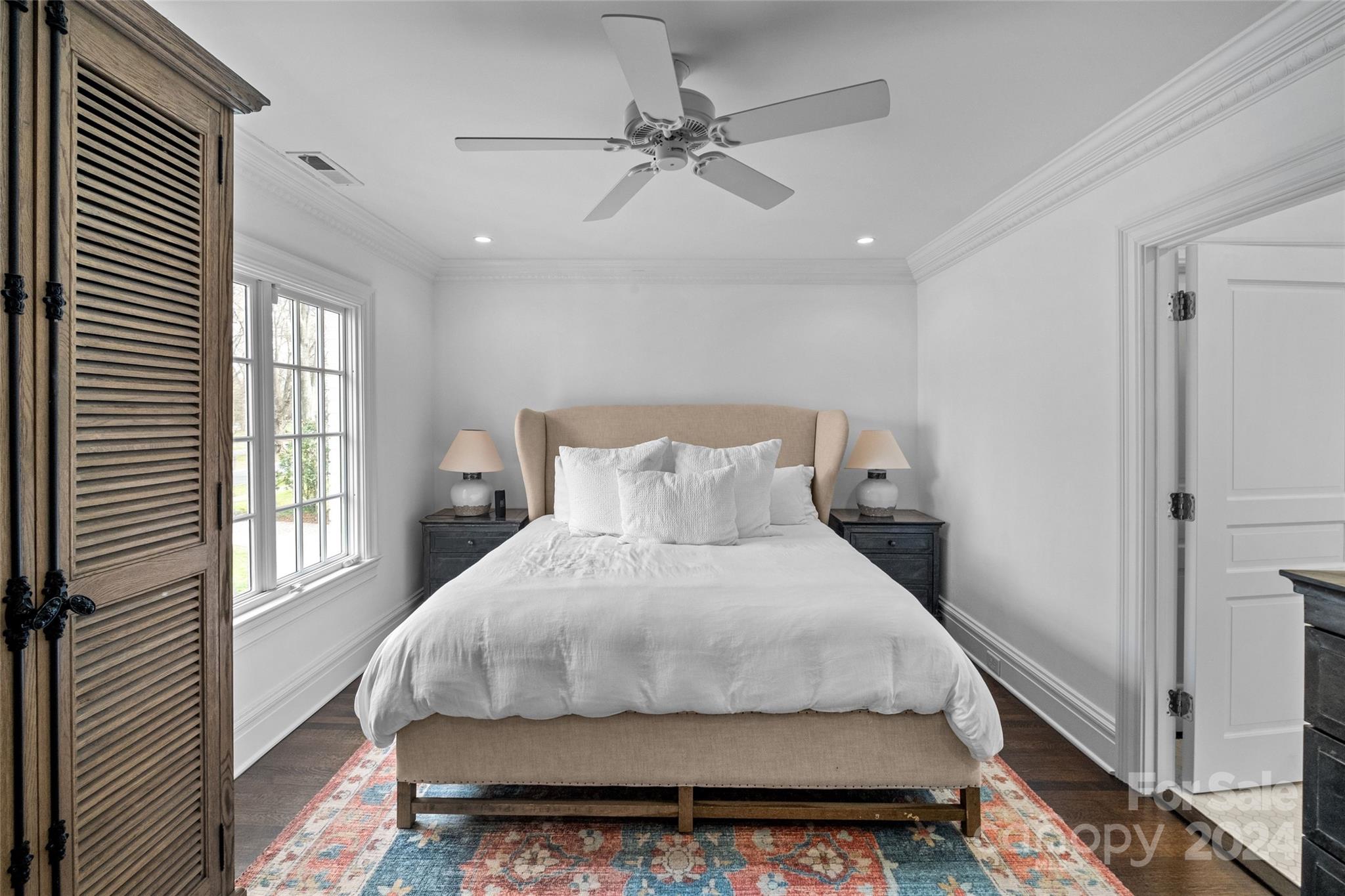 1930 Queens Road West Charlotte, NC 28209 - Photo 21 of 47 a bedroom with a bed and window