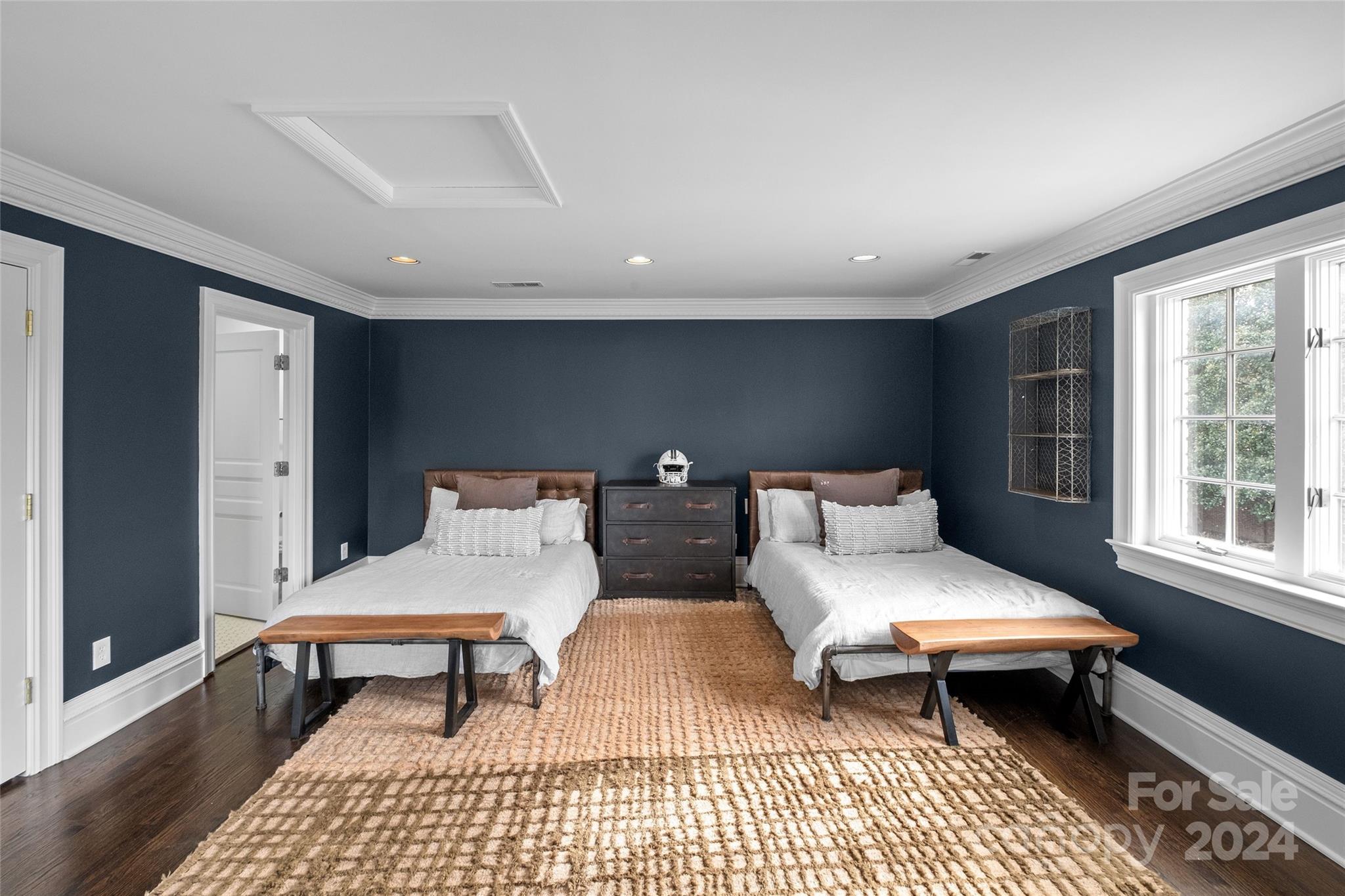 1930 Queens Road West Charlotte, NC 28209 - Photo 25 of 47 a bedroom with two beds and a window