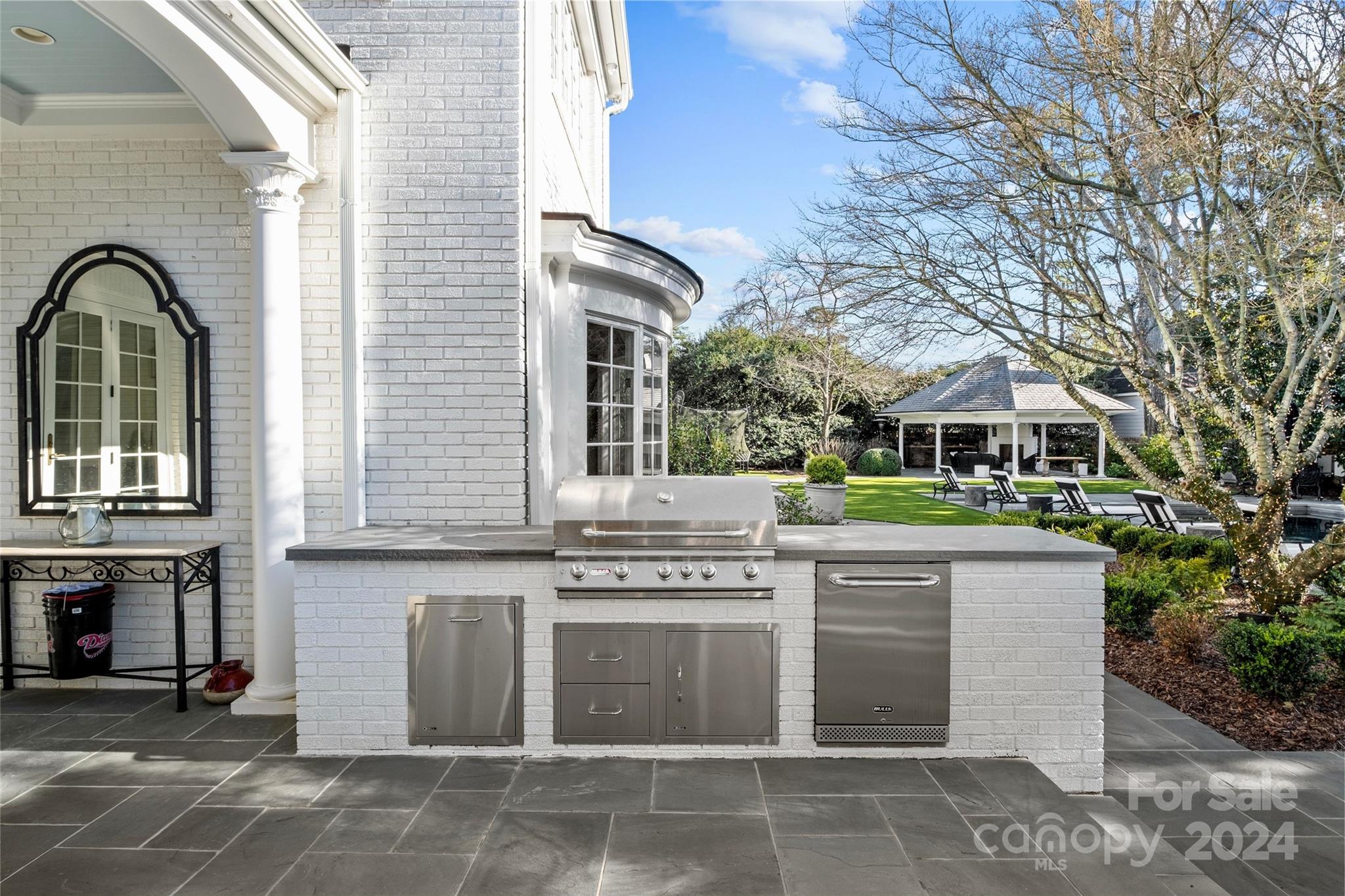 1930 Queens Road West Charlotte, NC 28209 - Photo 31 of 47 a front view of a house with a garden