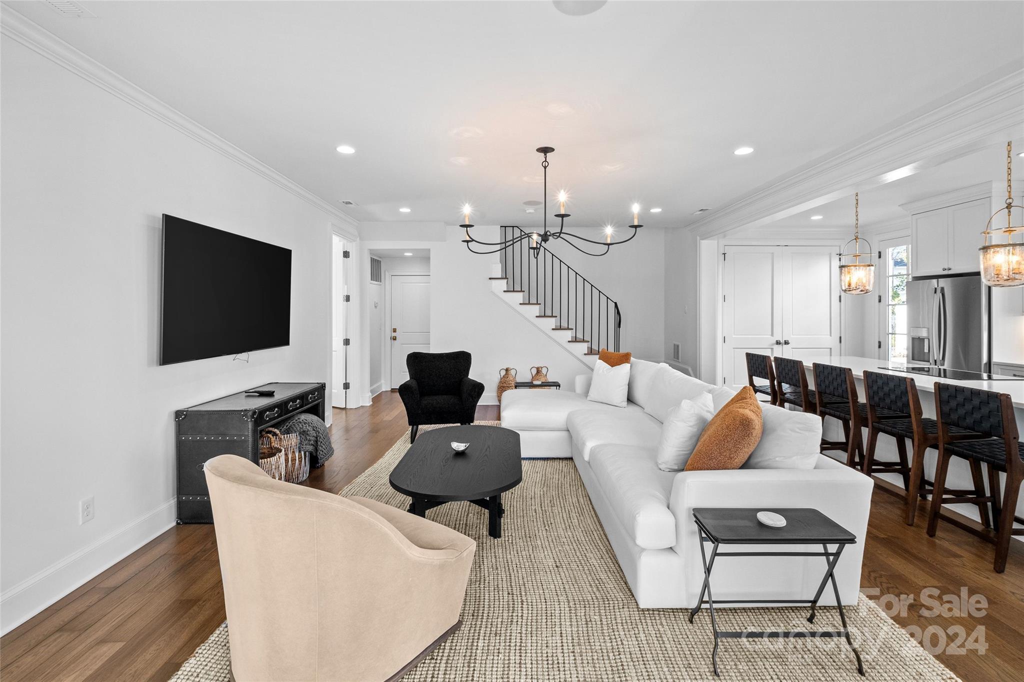 1930 Queens Road West Charlotte, NC 28209 - Photo 40 of 47 a living room with furniture and a flat screen tv