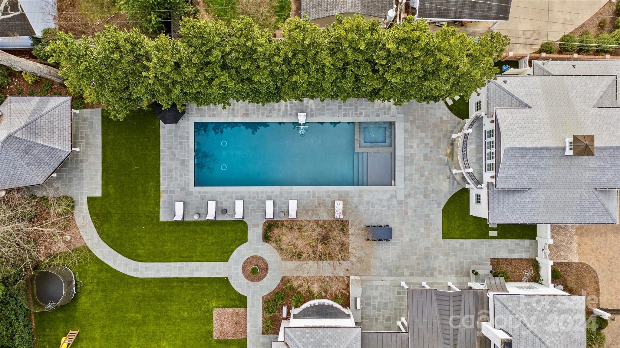 1930 Queens Road West Charlotte, NC 28209 - Photo 46 of 47 an aerial view of a house with garden space and sitting space