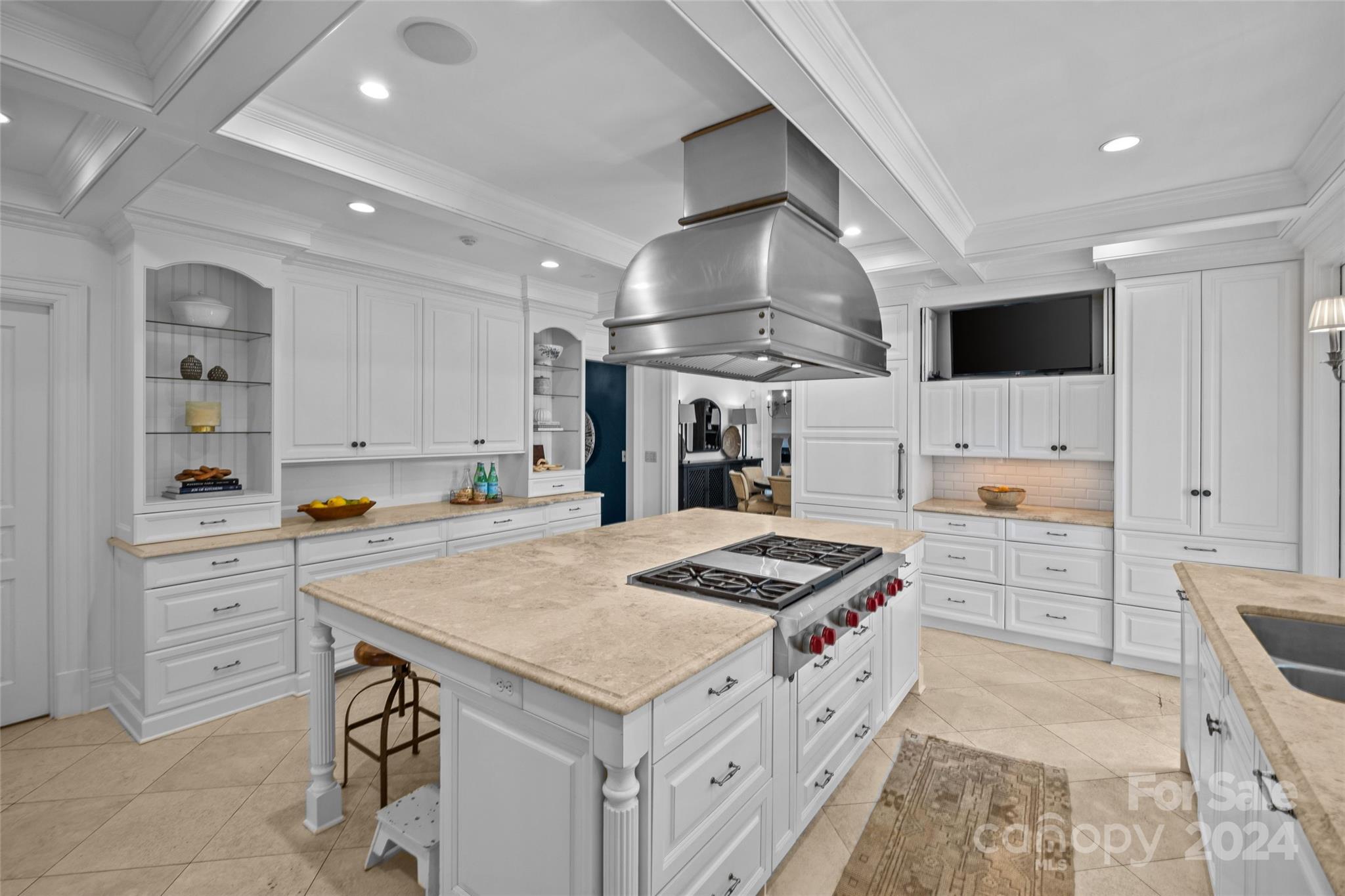 1930 Queens Road West Charlotte, NC 28209 - Photo 9 of 47 a kitchen that has a lot of cabinets in it and wooden floors