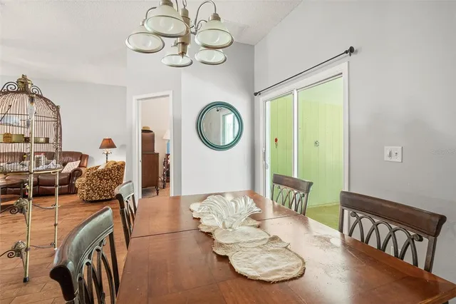 a kitchen with stainless steel appliances refrigerator and microwave