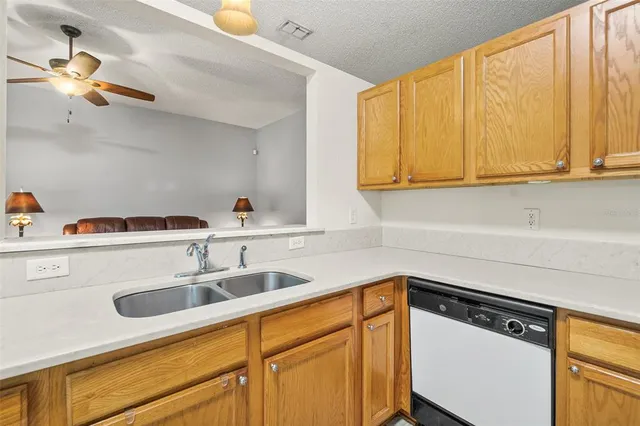 a bedroom with a bed and a dresser in it