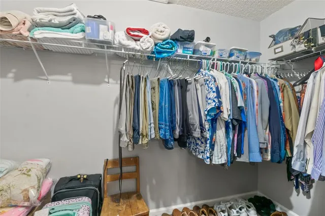 a living room with furniture and a garden