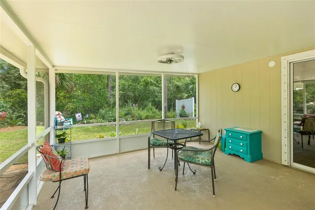 a room with a table and chairs