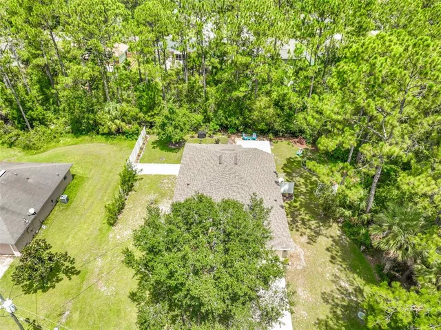 a bird view of a building and mountain view
