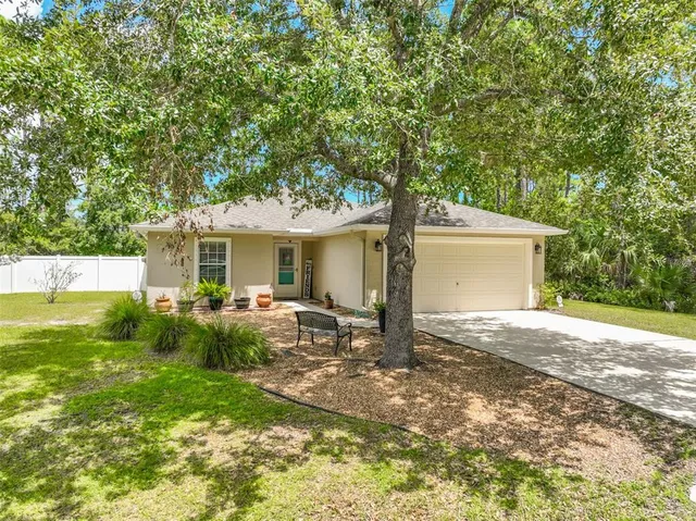 front view of a house with a patio