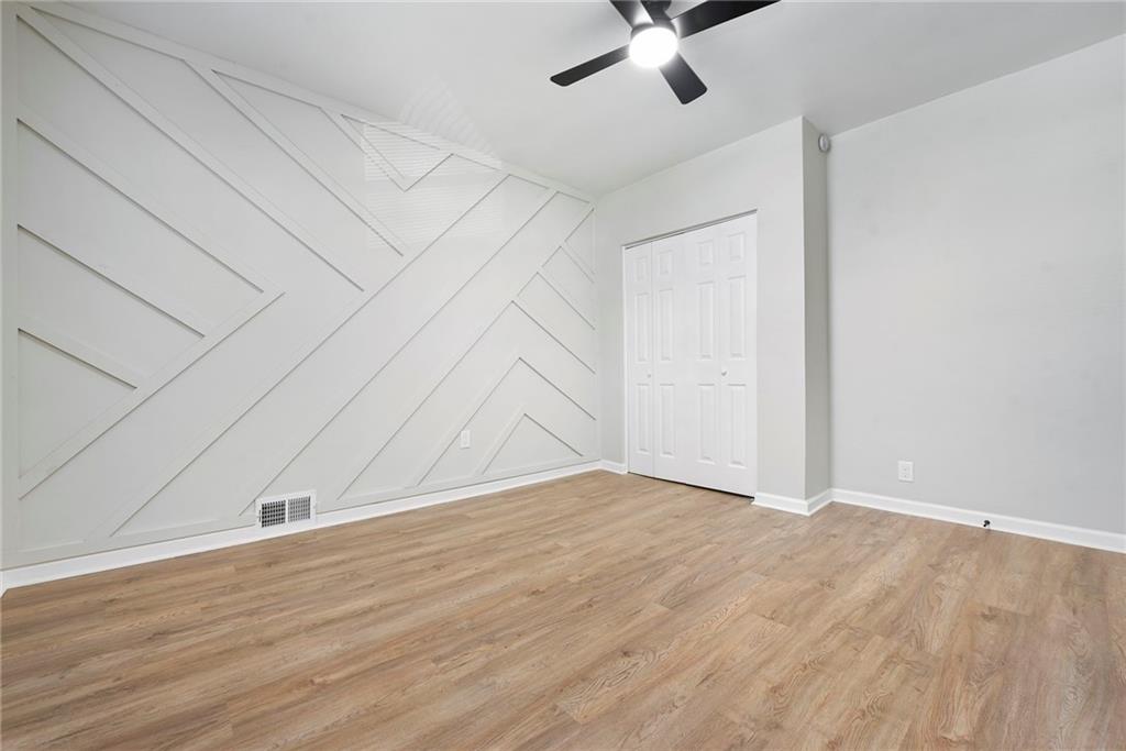 440 Ruxton Street Pittsburgh, PA 15211 - Photo 16 of 37 a view of an empty room with wooden floor