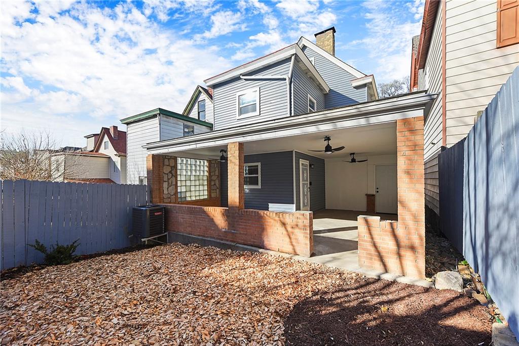 440 Ruxton Street Pittsburgh, PA 15211 - Photo 28 of 37 a front view of a house with a yard
