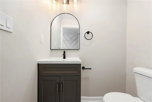 a bathroom with a sink and a toilet