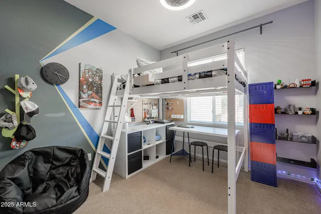 a view of a porch with furniture and plants
