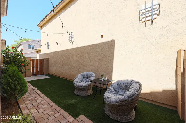 a view of balcony with furniture