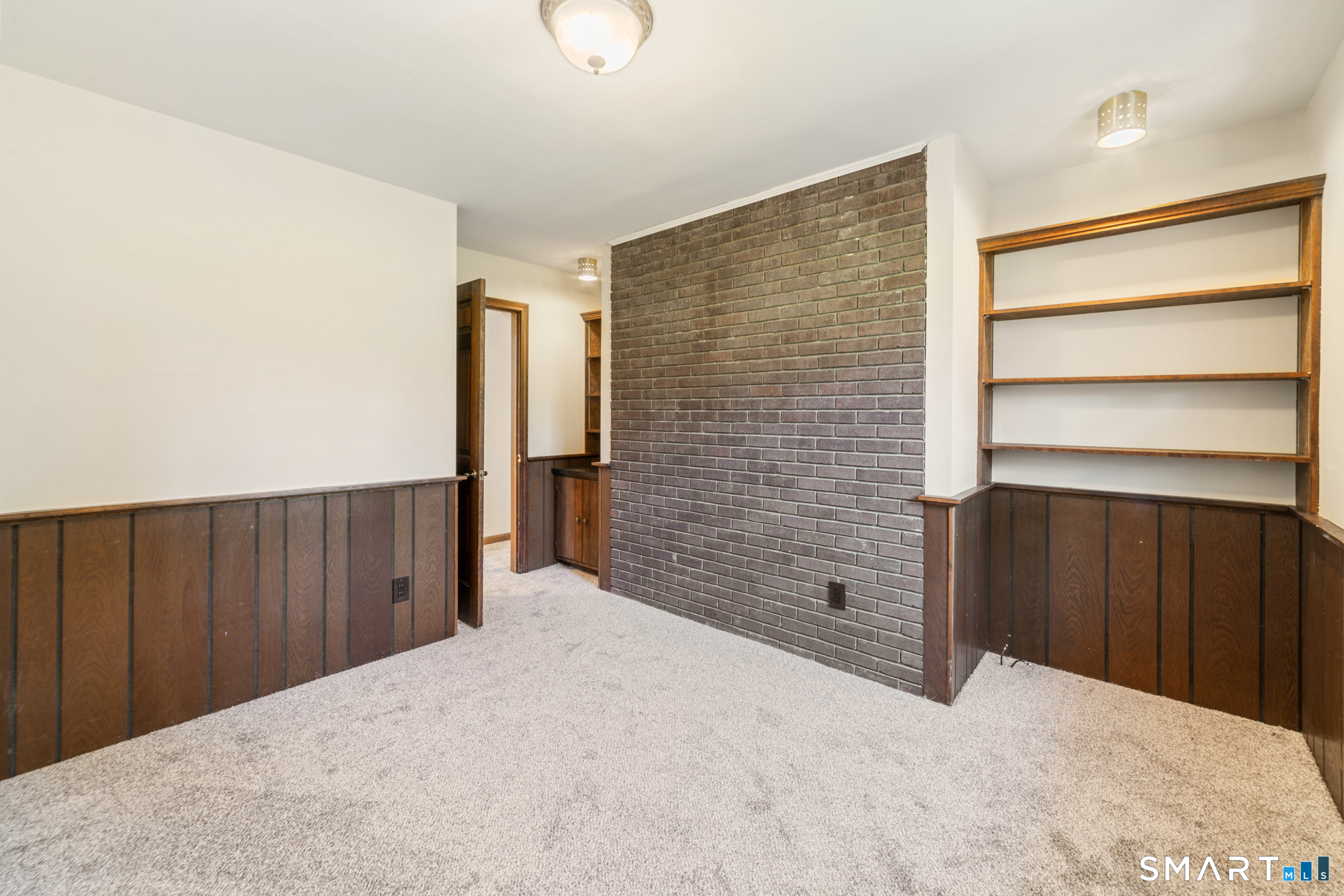 131 Sentinel Hill Road Derby, CT 06418 - Photo 17 of 40 a view of empty room with wooden walls