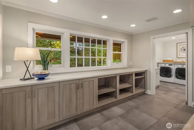 a kitchen with stainless steel appliances granite countertop a stove and a sink