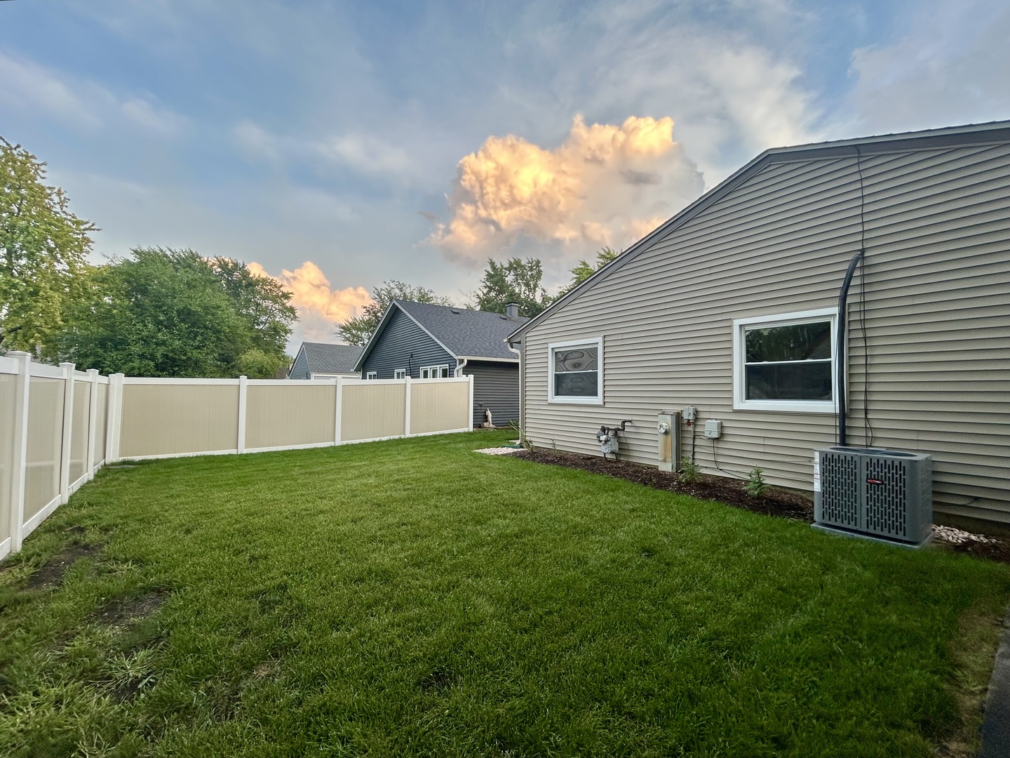 136 Heathgate Road Montgomery, IL 60538 - Photo 23 of 26 a view of a backyard with plants and a backyard
