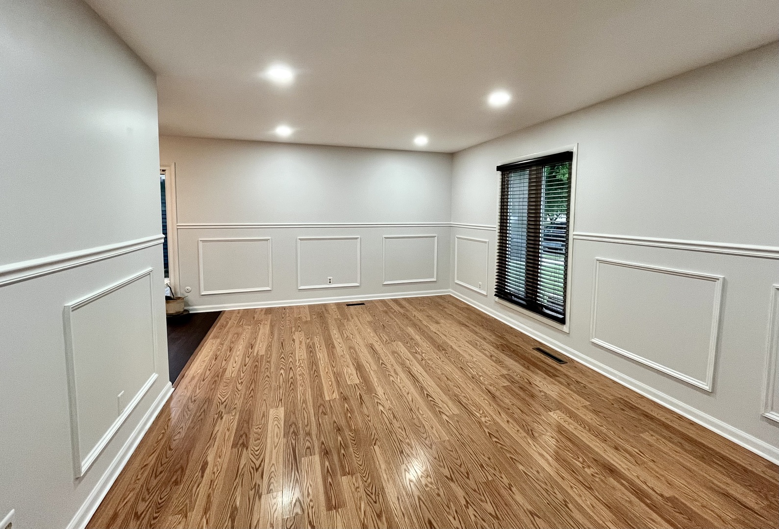 136 Heathgate Road Montgomery, IL 60538 - Photo 5 of 26 a view of empty room with wooden floor