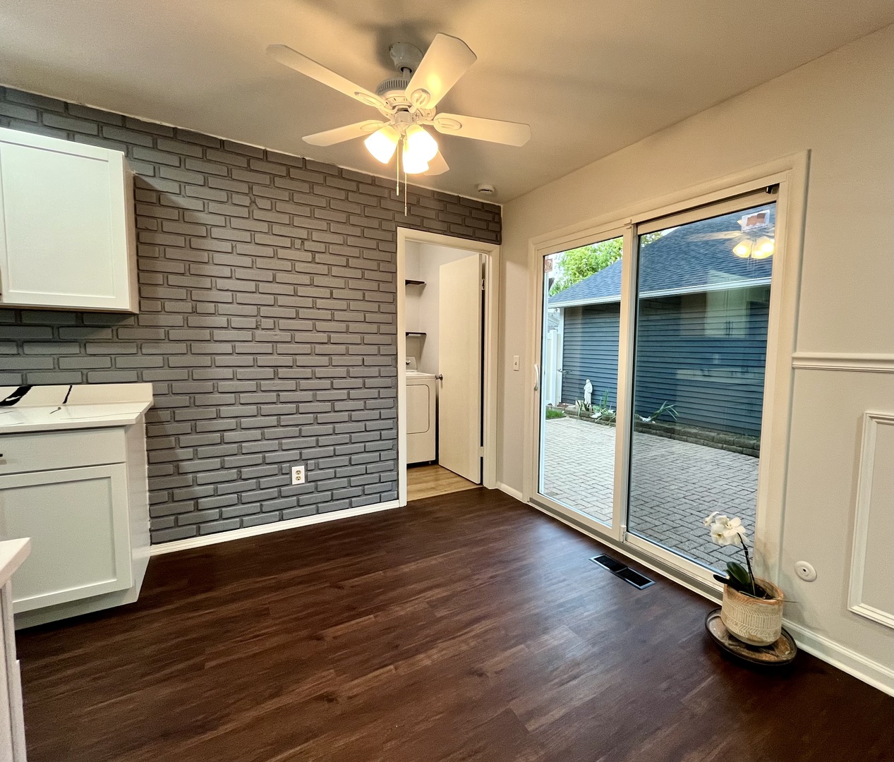 136 Heathgate Road Montgomery, IL 60538 - Photo 7 of 26 a view of an empty room with wooden floor and a window