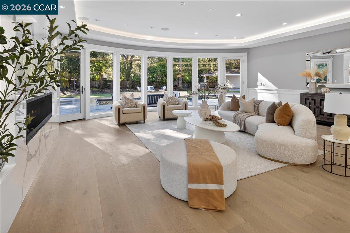 74 Middlefield Road Atherton, CA 94027 - Photo 11 of 49 a living room with furniture and a large window