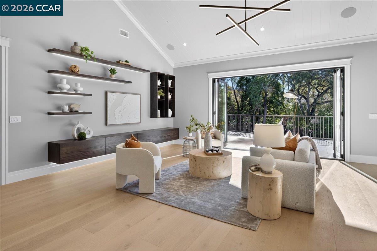 74 Middlefield Road Atherton, CA 94027 - Photo 12 of 29 a living room with furniture and a large window