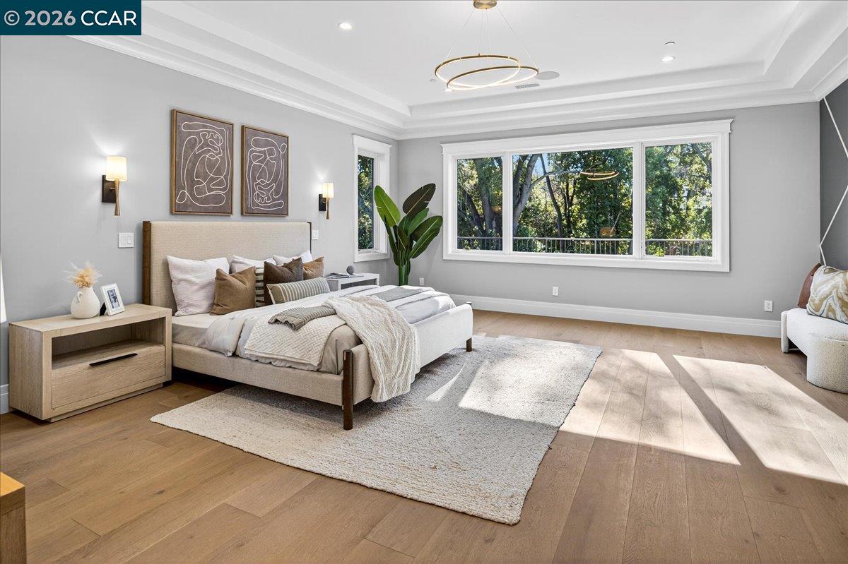 74 Middlefield Road Atherton, CA 94027 - Photo 13 of 29 a spacious bedroom with a bed and a large window