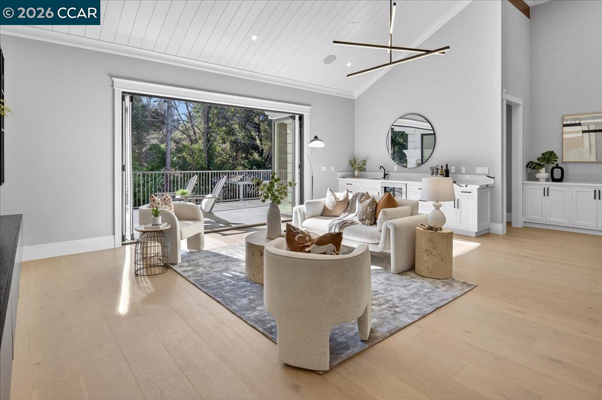 74 Middlefield Road Atherton, CA 94027 - Photo 21 of 49 a living room with furniture and a large window