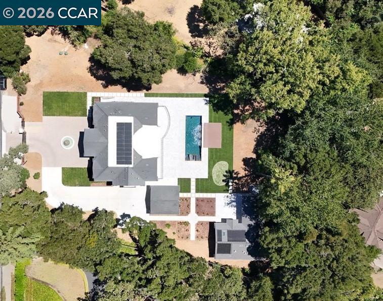 74 Middlefield Road Atherton, CA 94027 - Photo 26 of 29 an aerial view of a house with a yard and potted plants