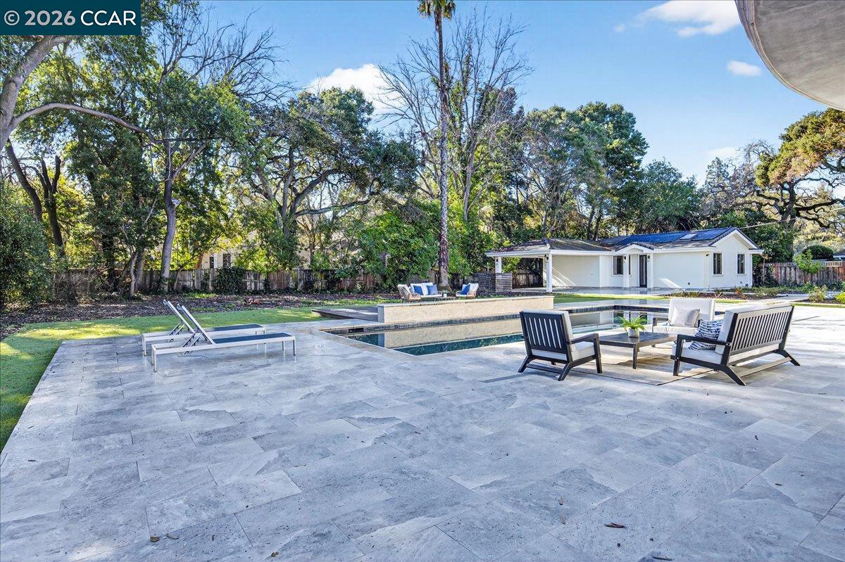 74 Middlefield Road Atherton, CA 94027 - Photo 44 of 49 a view of a backyard with swimming pool