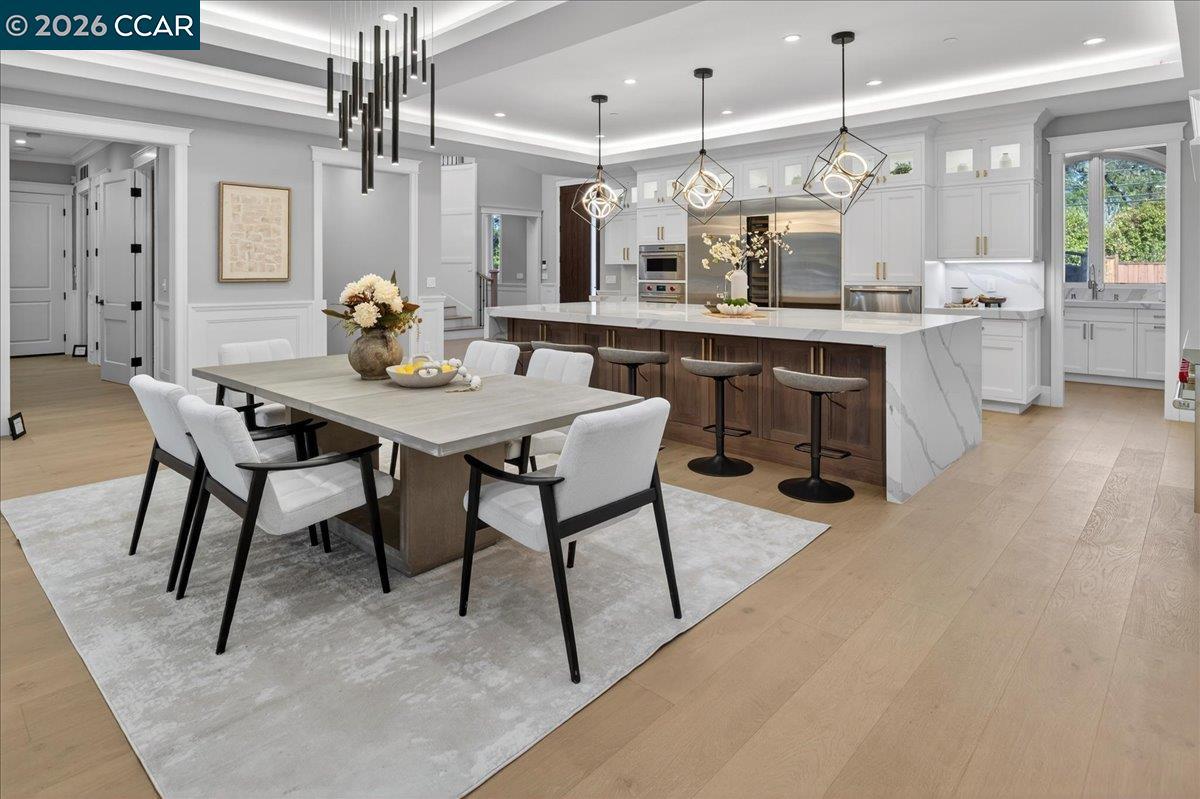 74 Middlefield Road Atherton, CA 94027 - Photo 8 of 49 a large kitchen with a table and chairs