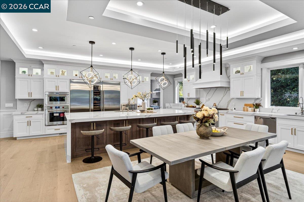 74 Middlefield Road Atherton, CA 94027 - Photo 9 of 49 a kitchen with a table and chairs in it