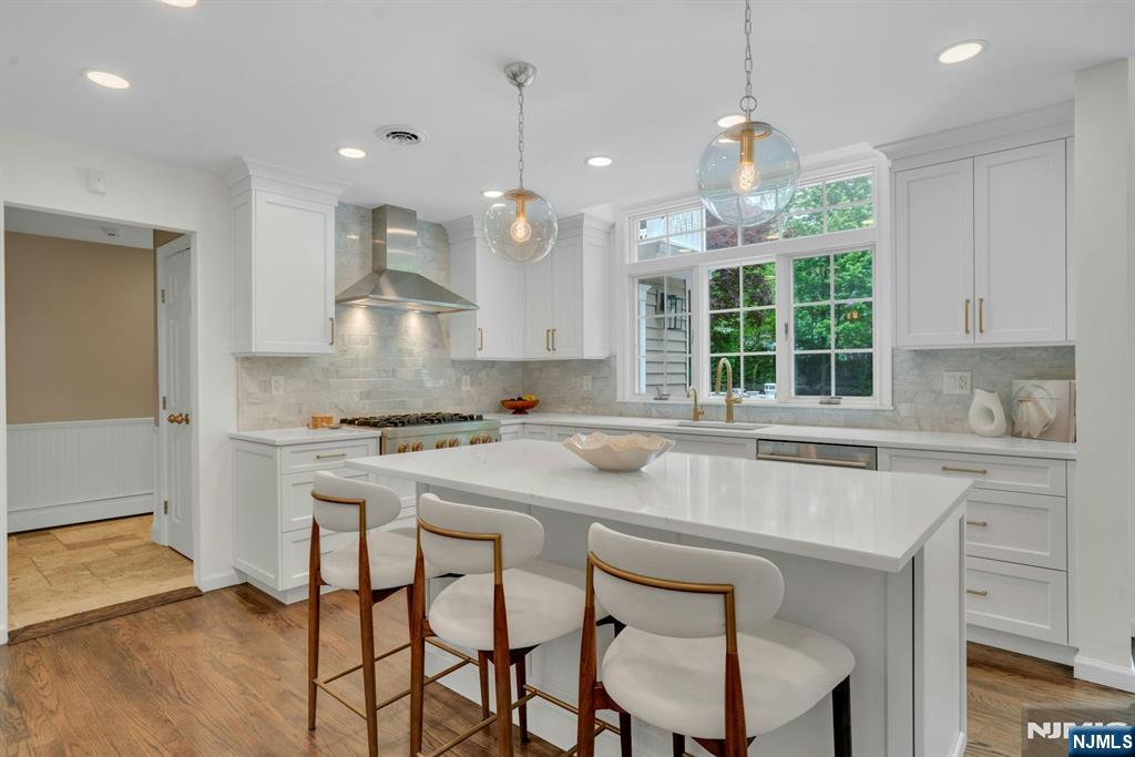48 Hopper Farm Road Upper Saddle River, NJ 07458 - Photo 14 of 43 a kitchen with a sink cabinets and window