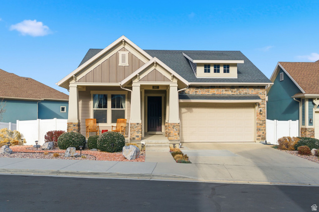 987 East Deer Arch Lane Draper, UT 84020 - Photo 3 of 46 Deceptively large modern Craftsman home featuring 3-car garage, 2-deep on one end, and Xeriscaped yard.