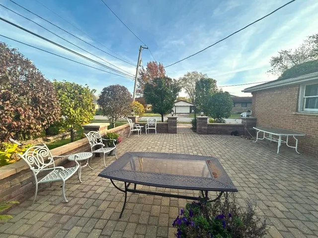 a view of a swimming pool with a patio