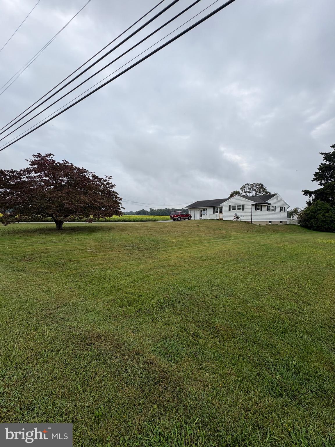 a view of a lake with a big yard