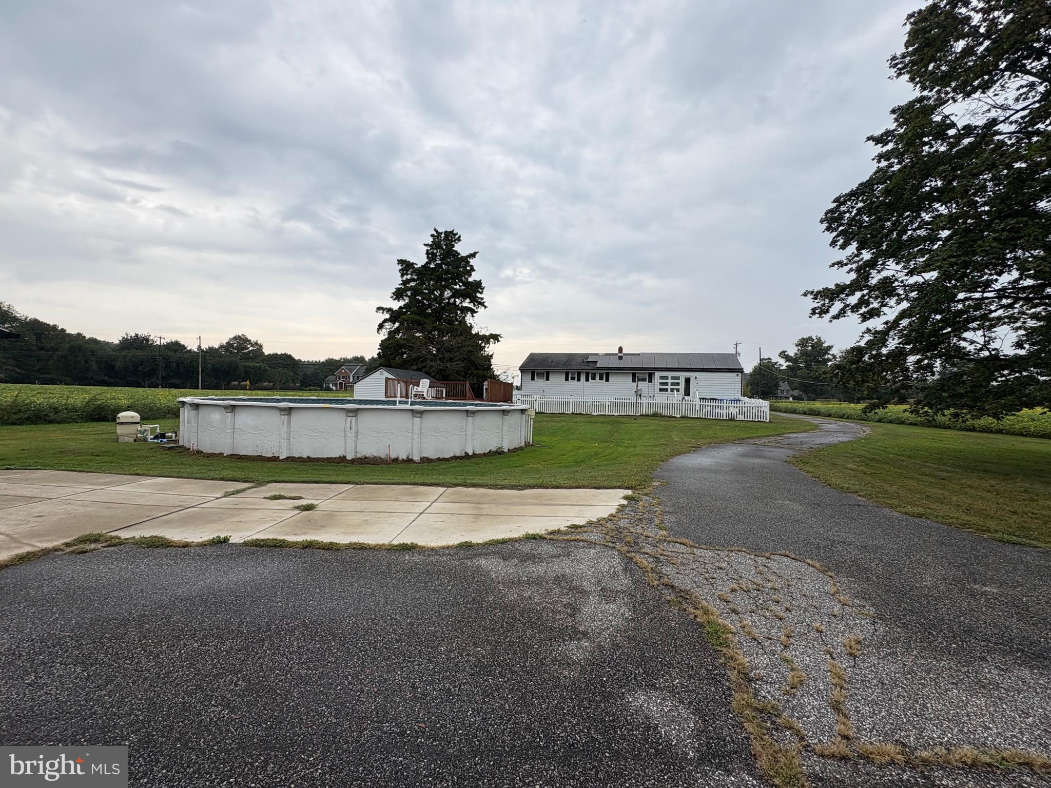 148 Amwellbury Road Salem, NJ 08079 - Photo 12 of 24 a view of a lake with houses in the back